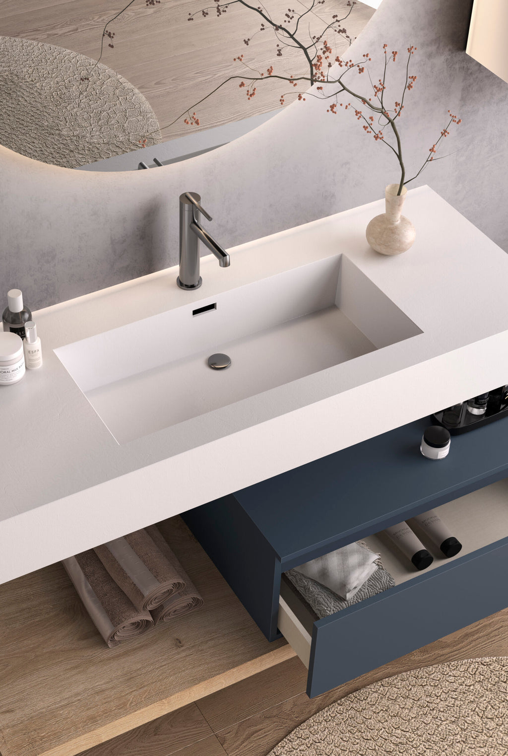 Composizione bagno stile Industrial con piano lavabo in appoggio sospeso e specchiera rotonda retroilluminata a LED