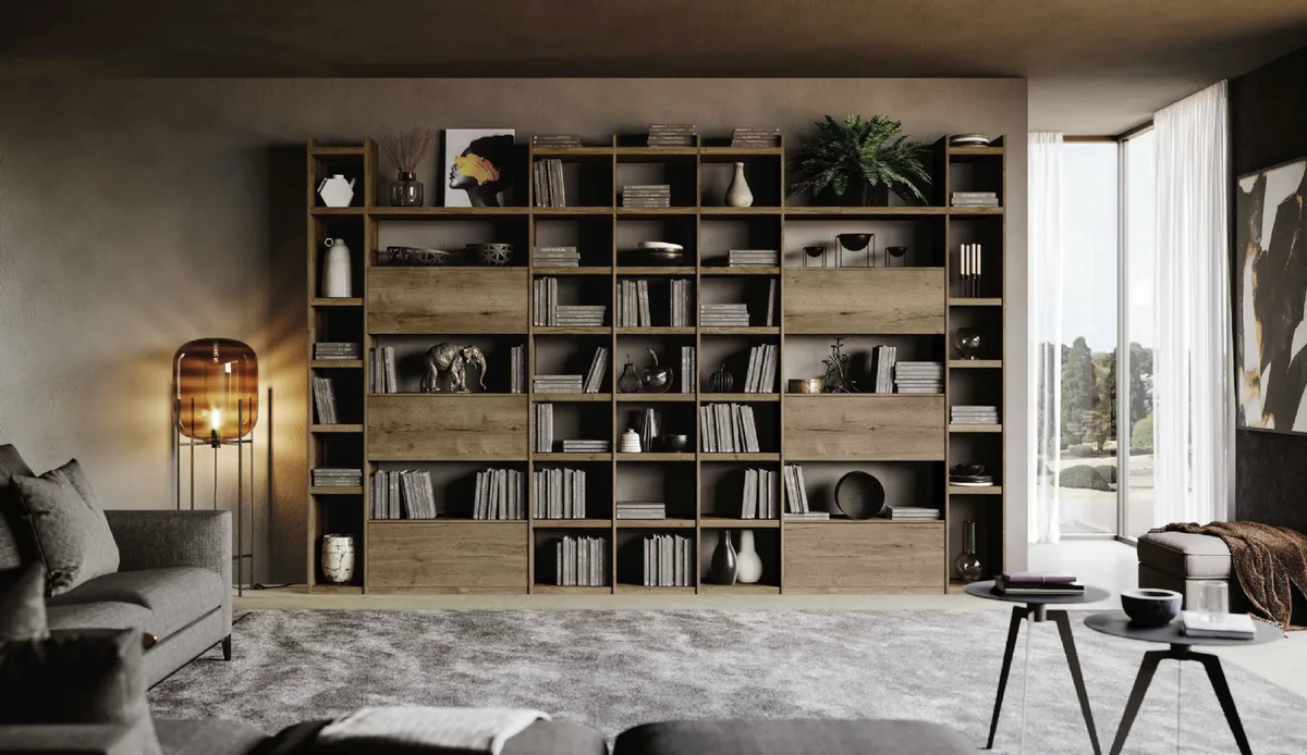 Composizione libreria a spalla con elementi a giorno/moduli contenitori
