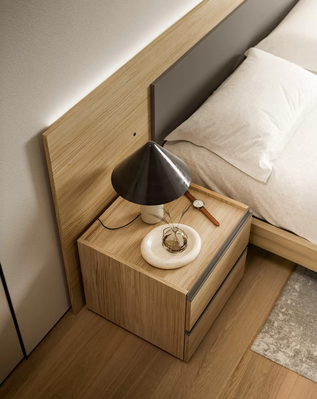 Camera matrimoniale moderna con armadio battente con gola, letto completo di boiserie e gruppo comodini/comò