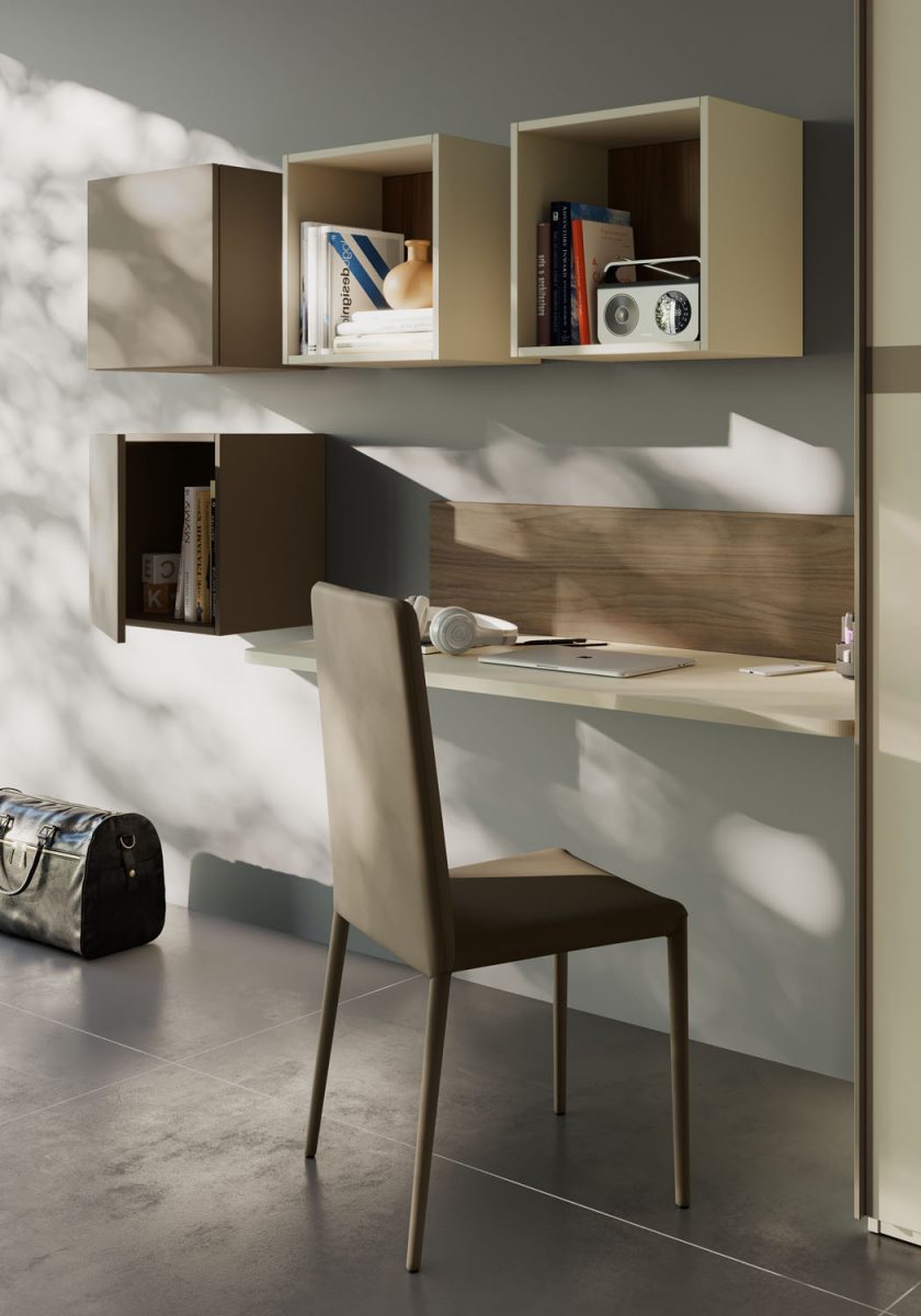 Camera con armadio 2 ante scorrevoli, letto con boiserie discontinua imbottita e piano scrivania