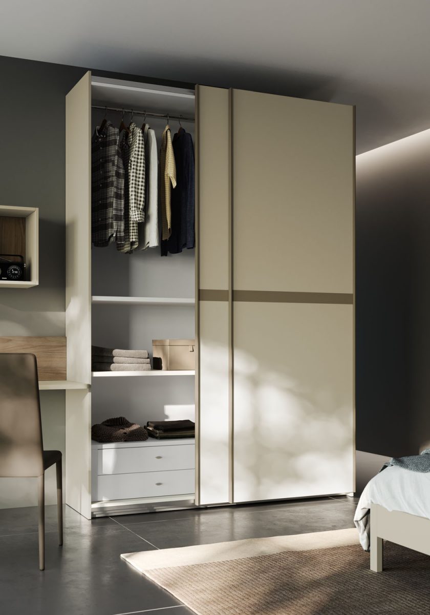 Camera con armadio 2 ante scorrevoli, letto con boiserie discontinua imbottita e piano scrivania